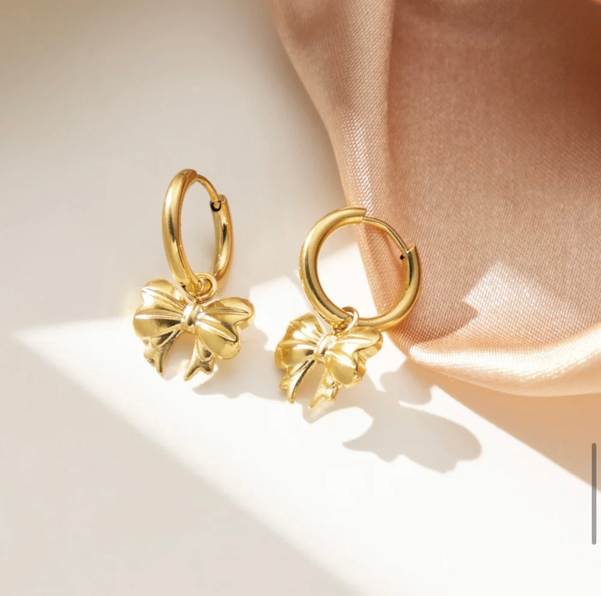 Gold earrings with cute bow